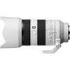 A white telephoto lens with a lens hood attached, shown from the side against a white background. Produktbild-Vorschau
