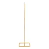 A gold-colored stand on a white background. Podgląd zdjęcia produktu