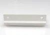 A white door handle on a white background. Produktbild-Vorschau