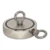 A close-up studio shot of a round, silver magnet with two eyelets, set against a plain white background. Produktbild-Vorschau