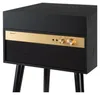A close-up shot of a black and gold record player with wooden accents and black legs. Produktbild-Vorschau