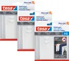 Three packages of tesa Powerstrips adhesive nails for hanging items on walls. Anteprima dell’immagine prodotto