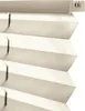 A close-up view of a pleated blind, showing its texture and folds. Produktbild-Vorschau