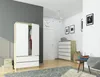 A bedroom or dressing room with a wardrobe and chest of drawers. Podgląd zdjęcia produktu