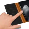 A hand is shown interacting with a phone case. Náhľad obrázku produktu