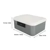 A grey storage box with a white lid and a black digital lock on the front, with dimensions indicated. Produktbild-Vorschau