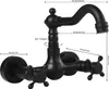 A black wall-mounted faucet with dimensions indicated by measurement lines and text. Produktbild-Vorschau