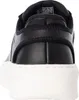 The back view of a black and white Skechers sneaker. Produktbild-Vorschau