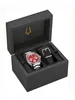A watch and an extra strap are presented in an open black box. Náhled obrázku produktu