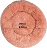 A round, plush pet bed with size indicators. Anteprima dell’immagine prodotto