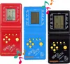 Three brick game consoles in red, blue, and black, arranged side-by-side. Náhled obrázku produktu