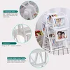 A white Ferris wheel photo frame is displayed on a table with a checkered cloth. There are close-up insets highlighting specific features of the frame. Voir les images du produit