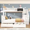 A white bunk bed with stairs and drawers in a child's room decorated with hot air balloons and clouds. Produktbild-Vorschau