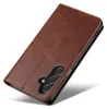 A brown leather flip phone case is shown against a white background. Produktbild-Vorschau