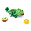 A toy chameleon with accessories on a white background. Anteprima dell’immagine prodotto