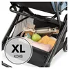 Close-up view of the storage basket of a stroller, filled with various items. Produktbild-Vorschau