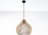 A pendant light with a wooden shade. Anteprima dell’immagine prodotto