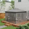 A screened gazebo set up on a wooden deck next to a house, with outdoor furniture inside. Produktbild-Vorschau