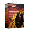 The image shows the retail packaging of a gaming mouse. The box is predominantly black and red with yellow accents, featuring graphics of the mouse and text detailing its features. Produktbild-Vorschau