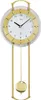 A gold and white pendulum clock against a white background. Anteprima dell’immagine prodotto