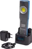 A product shot of a rechargeable LED work light with its charging base, USB cable, and power adapter. Produktbild-Vorschau