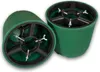 Two green Christmas tree stands are shown from a slightly elevated angle against a white background. Voir les images du produit