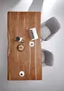 A top-down view of a wooden dining table with two chairs, a laptop, and some food and drinks on it. Produktbild-Vorschau