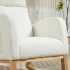 Close-up view of a cream-colored armchair with a textured fabric and wooden legs. Anteprima dell’immagine prodotto