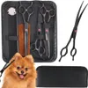 A set of grooming scissors and a comb are displayed in a black case, with a Pomeranian dog in the foreground. Náhľad obrázku produktu