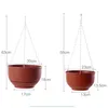 Two brown hanging planters with chains are shown side-by-side with dimensions indicated by lines and text. Podgląd zdjęcia produktu
