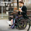 A woman sits on a park bench with a folding electric bike next to her, holding a coffee cup and looking at her phone. Produktbild-Vorschau