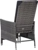 The back view of a grey rattan garden recliner chair with a black cushion. Náhľad obrázku produktu