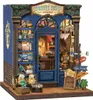 A miniature model of a bookshop called 'Journey Trace Bookshop'. Náhled obrázku produktu