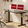 A modern home office setup with a standing desk, dual monitors, and a chair. Voir les images du produit