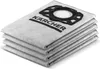 A stack of vacuum cleaner bags with a black plastic adapter on top. Náhľad obrázku produktu