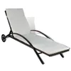 A brown poly rattan sun lounger with a white cushion and black wheels, shown on a white background. Náhľad obrázku produktu