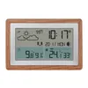 A digital weather station with a wooden frame, displaying time, date, temperature, and humidity. Podgląd zdjęcia produktu