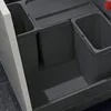 A close-up view of a dark gray waste separation system inside a kitchen cabinet drawer. Produktbild-Vorschau