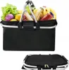 A black foldable shopping basket filled with groceries, shown from the front and a folded view below. Anteprima dell’immagine prodotto