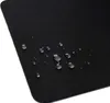 A close-up of a black surface with water droplets on it. Náhľad obrázku produktu