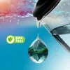 A close-up of a water droplet reflecting a mountain landscape, with a BPA-free logo and a glass pitcher pouring water in the background. Produktbild-Vorschau