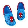 A pair of blue Spider-Man clogs with red accents, shown against a white background. Produktbild-Vorschau