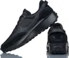 A pair of black Nike Waffle Debut sneakers are shown against a white background. Náhled obrázku produktu