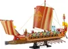 A detailed model of a Roman warship on a black display stand against a white background. Voir les images du produit