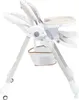A baby high chair is shown from a side angle against a white background. Anteprima dell’immagine prodotto