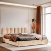 A bedroom scene featuring a bed with a beige upholstered headboard and frame. Anteprima dell’immagine prodotto