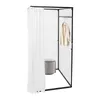 A freestanding changing room with a white curtain, a hanging garment, and a stool. Voir les images du produit