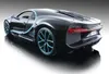 A black Bugatti Chiron model car with blue accents is shown from a rear-side angle on a reflective surface. Voir les images du produit