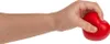 A hand is squeezing a red heart-shaped stress ball against a white background. Produktbild-Vorschau
