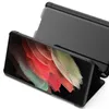 A black flip case for a Samsung Galaxy S21 Ultra 5G phone is shown with the phone's screen displaying a colorful abstract image. Produktbild-Vorschau
